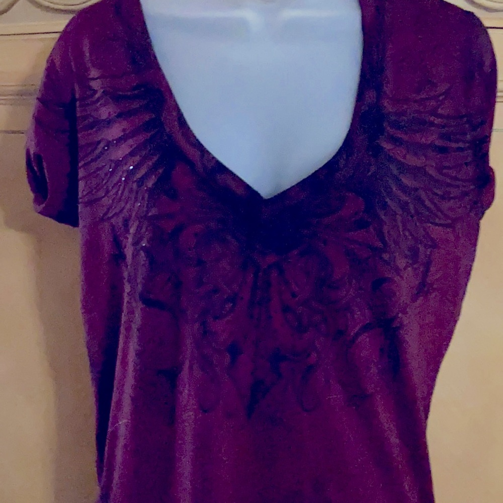 Burgundy top with black detail.